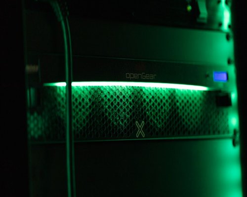 Server room with green glowing lights